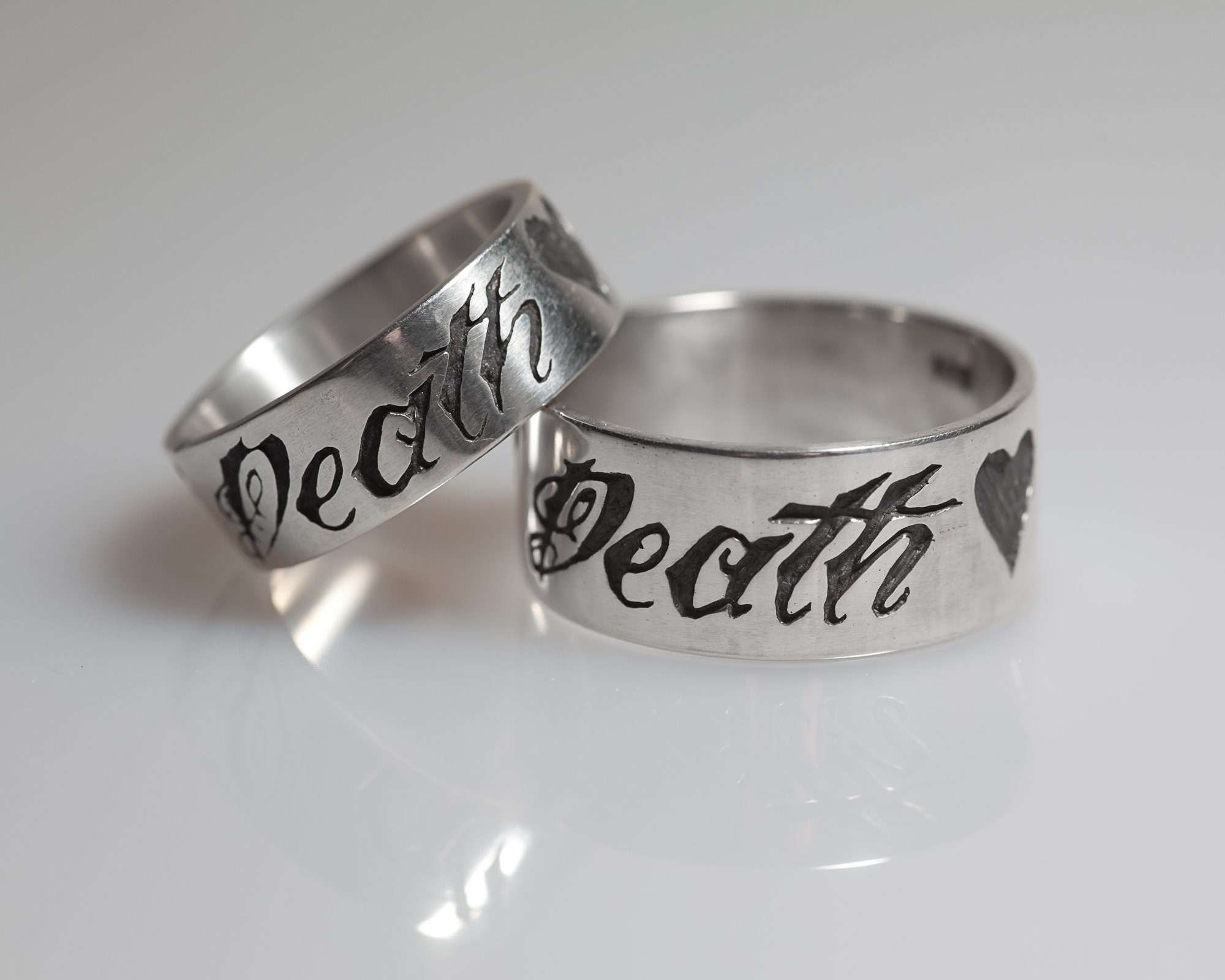 His and hers Till Death sterling silver ring set with matching engraved bands